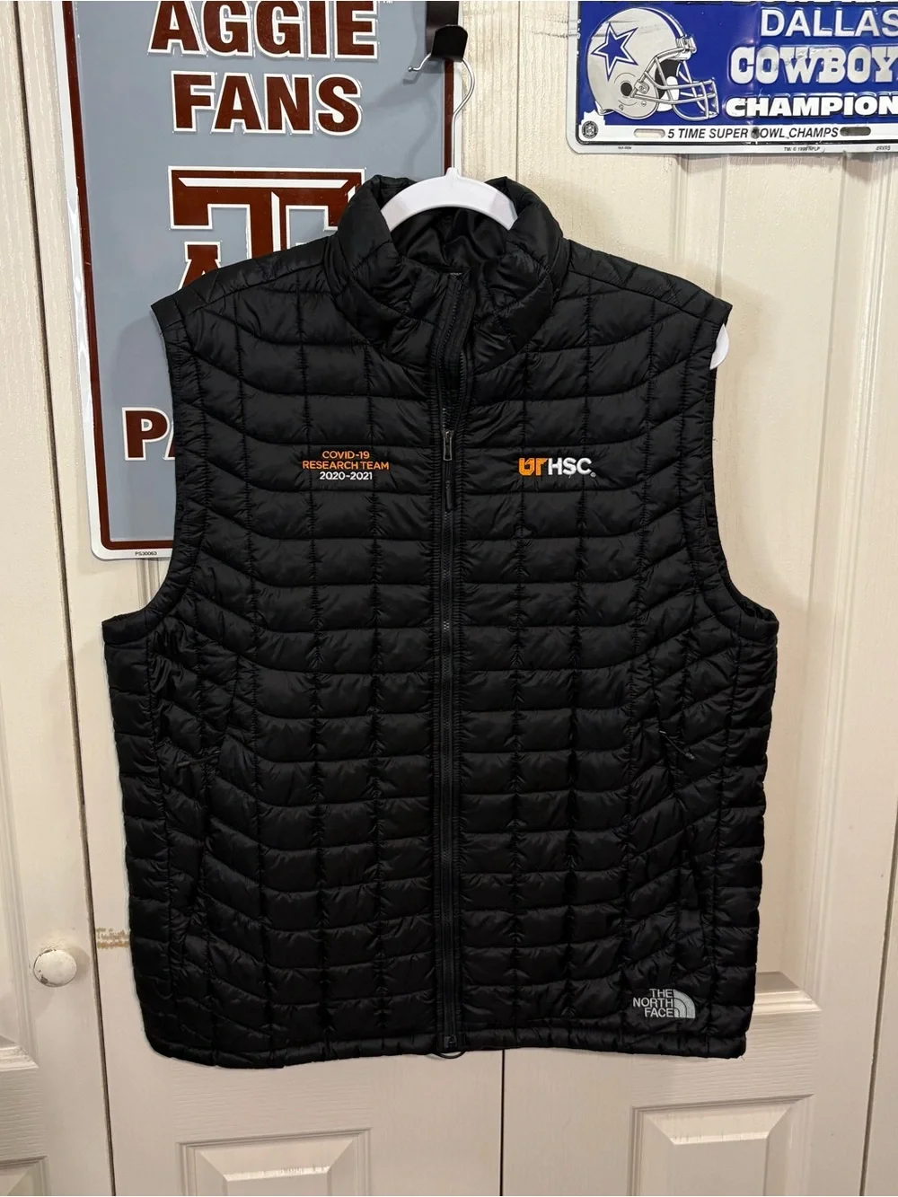 The North Face Black Quilted Puffer Vest with UT HSC Embroidery